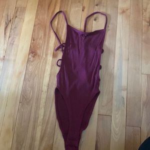 Cute body suit with open back